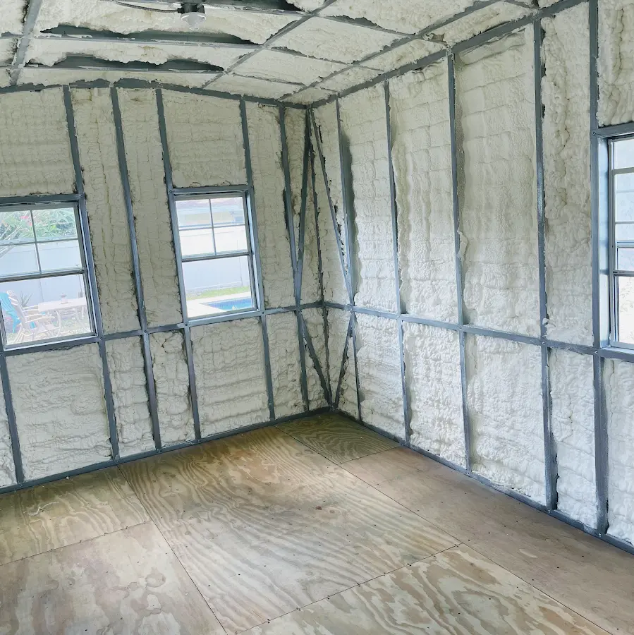 Closed-cell spray foam insulation applied to wall cavities in a residential project in Elko