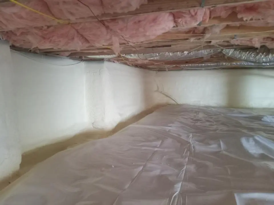 Crawl space encapsulation with closed-cell spray foam for Commercial Roof Restoration in Elko